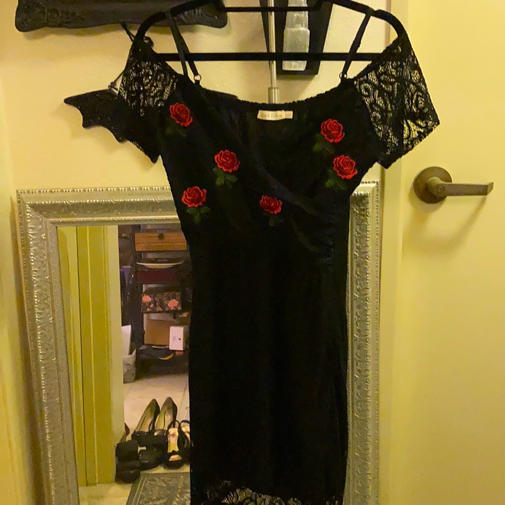 Black lace dress with rose appliqués s